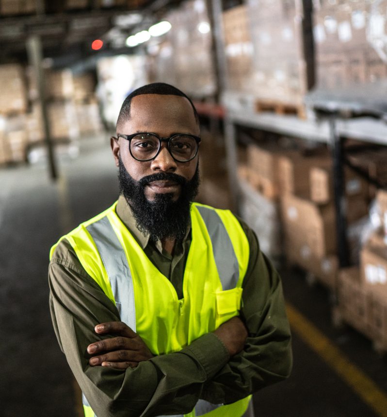 Logistics employee warehouse portrait